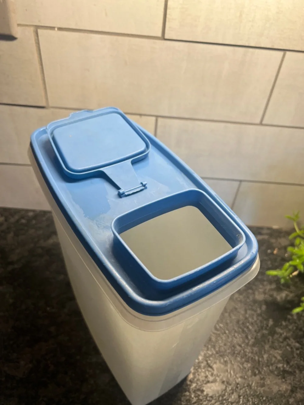 Vintage Tupperware Pour N Store Airtight Cereal Container. Blue lid. 10” tall.